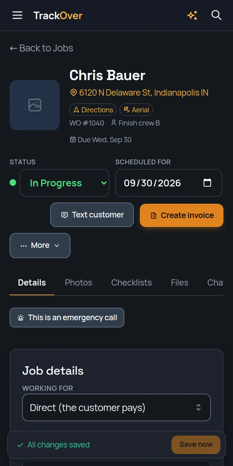 A TrackOver job page on a phone: customer, address, status and the invoice button