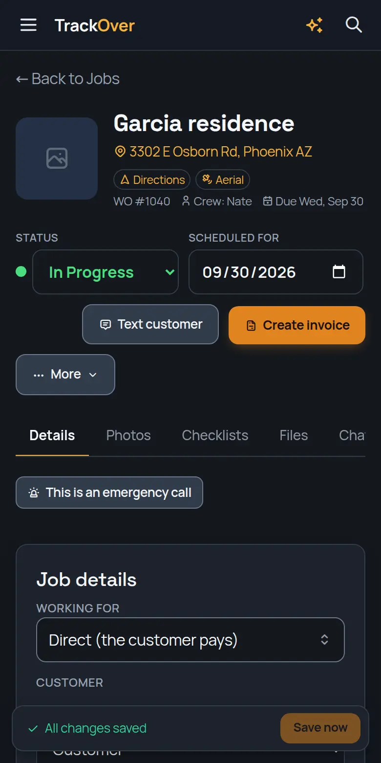 A TrackOver job page on a phone: customer, address, status and the invoice button