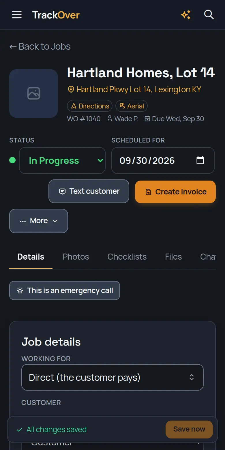 A TrackOver job page on a phone: customer, address, status and the invoice button
