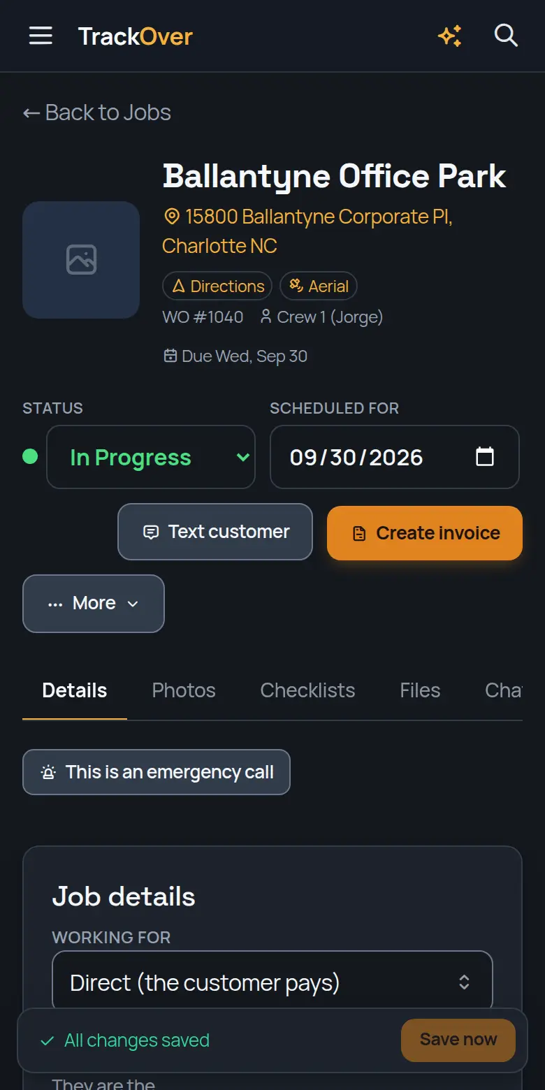 A TrackOver job page on a phone: customer, address, status and the invoice button
