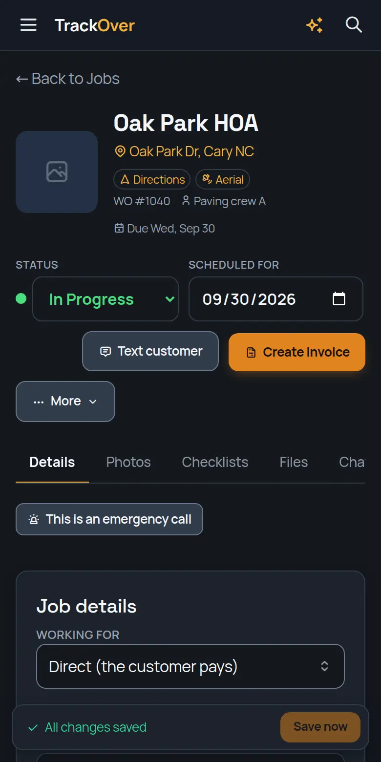 A TrackOver job page on a phone: customer, address, status and the invoice button