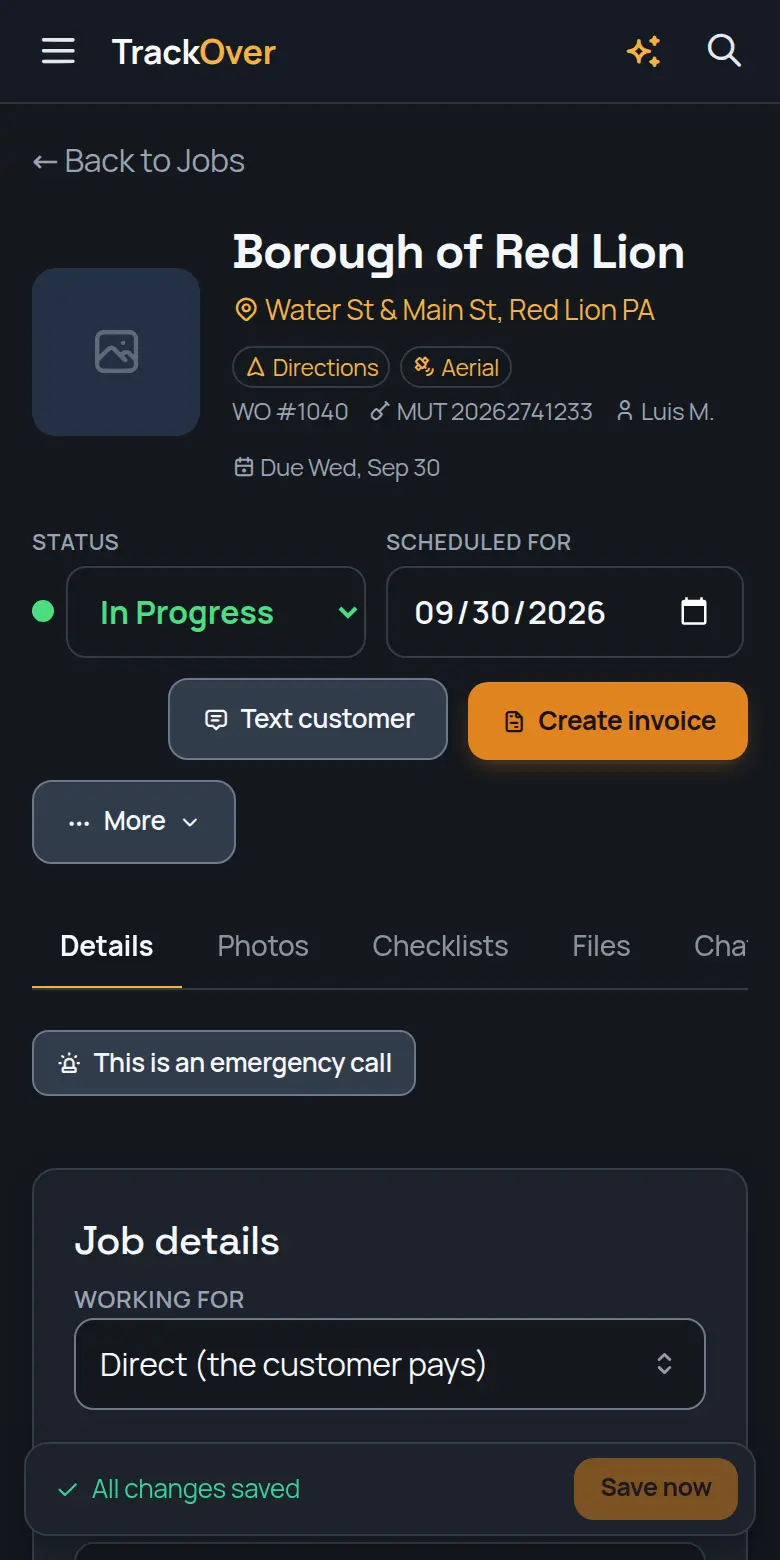 A TrackOver job page on a phone: customer, address, status and the invoice button