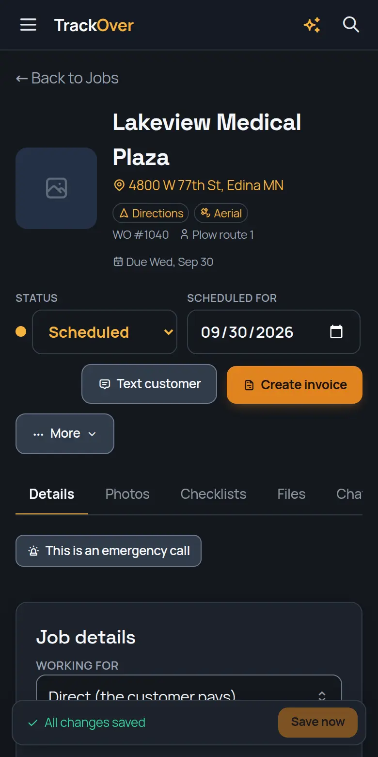 A TrackOver job page on a phone: customer, address, status and the invoice button